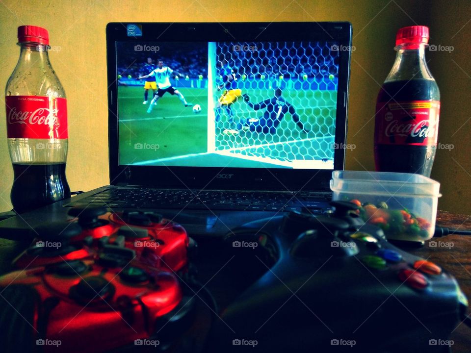 Enjoying the game with coca-cola!