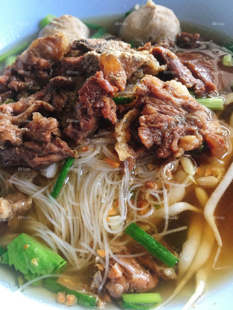 Thai noodle soup with beef and meat ball