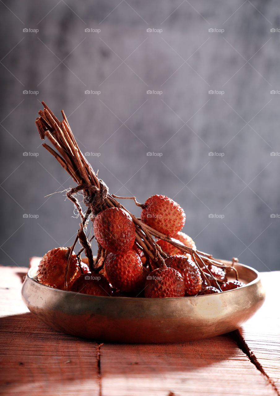 Fresh Litchi fruit in an old style metal plate