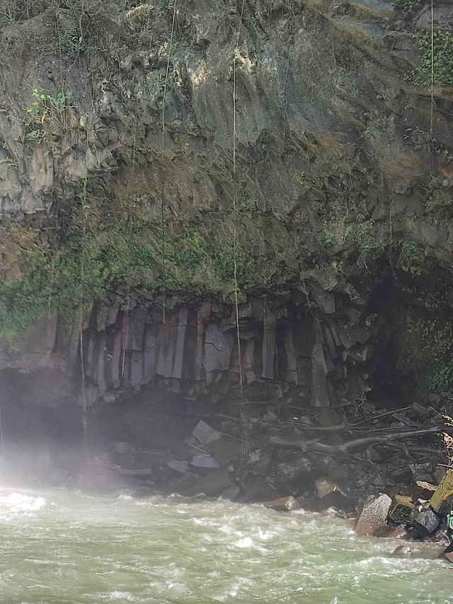 cliff by the waterfall