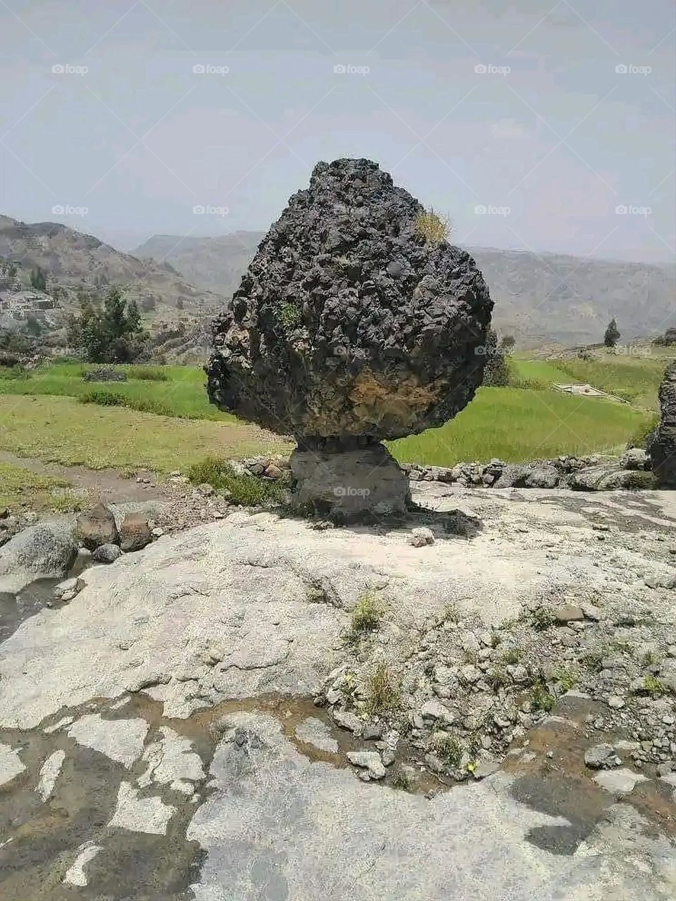 Glory be to God, the magnificent and picturesque view and the natural green trees are a view that is nothing more wonderful than it