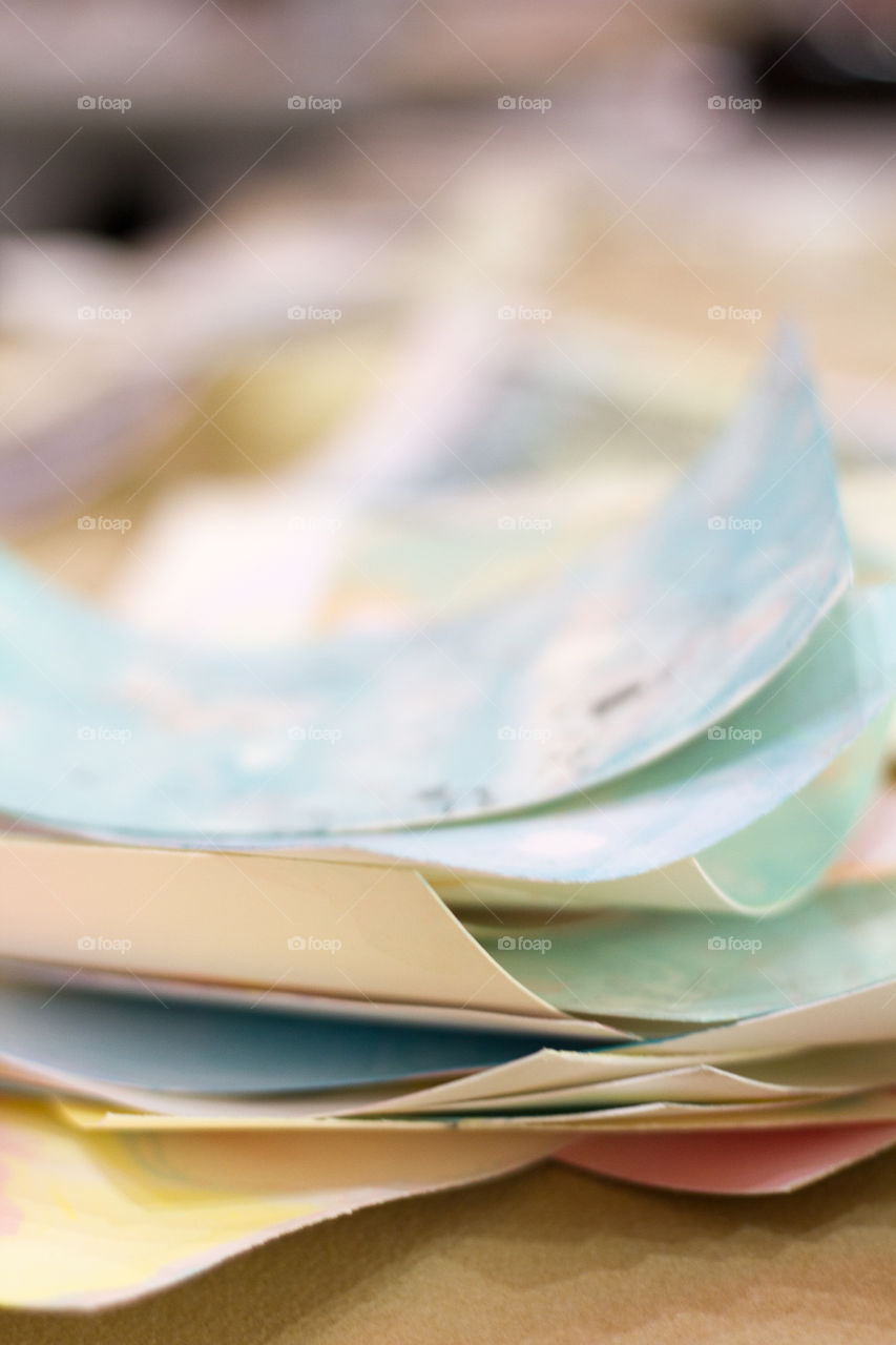 A stack of watercolour paintings