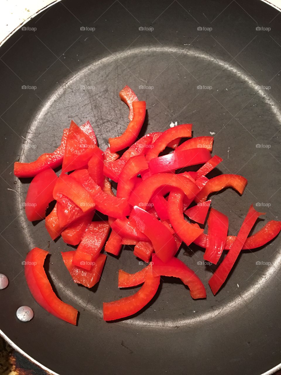 Cooking peppers.