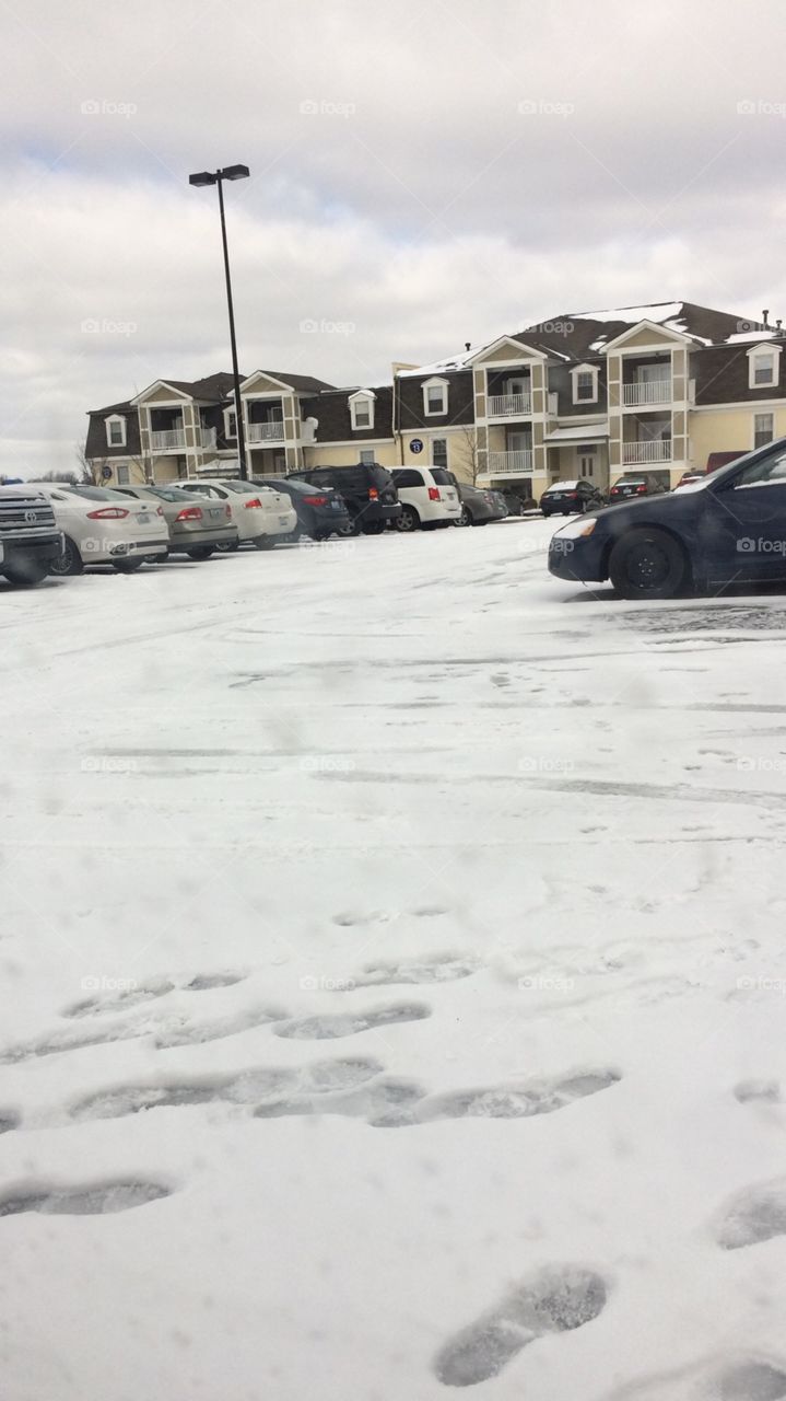 Snow covered parking lot after blizzard.