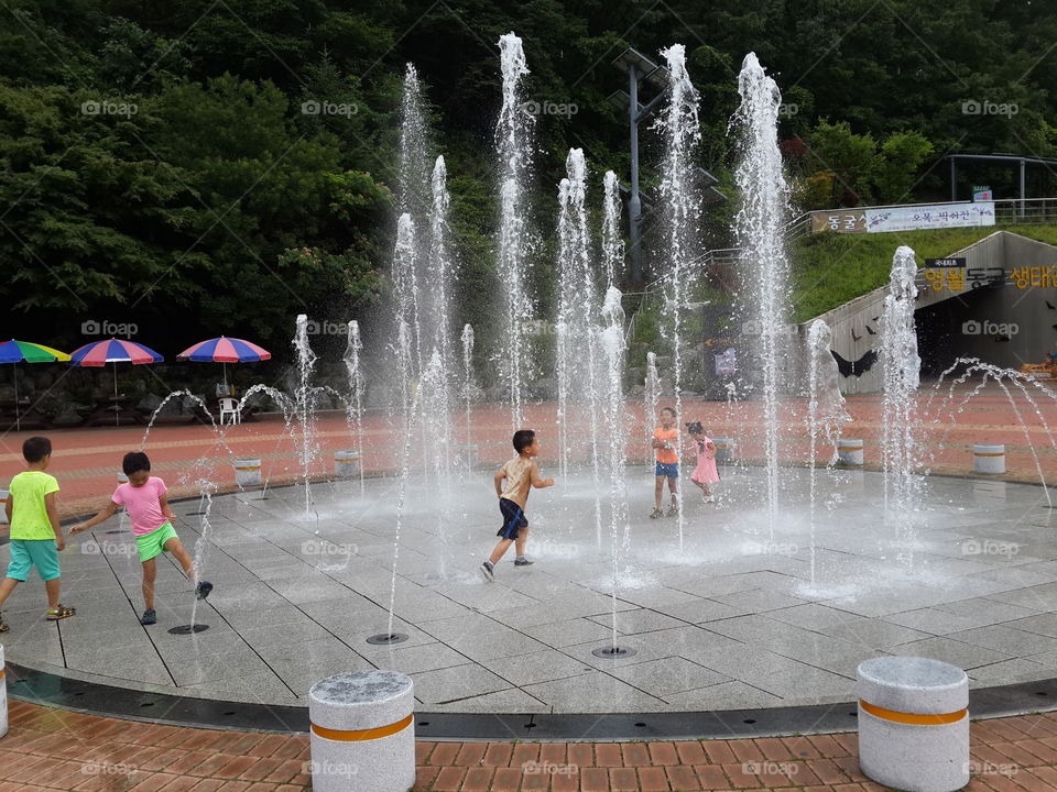 playing with the water . during my cultural trip, Korea 
