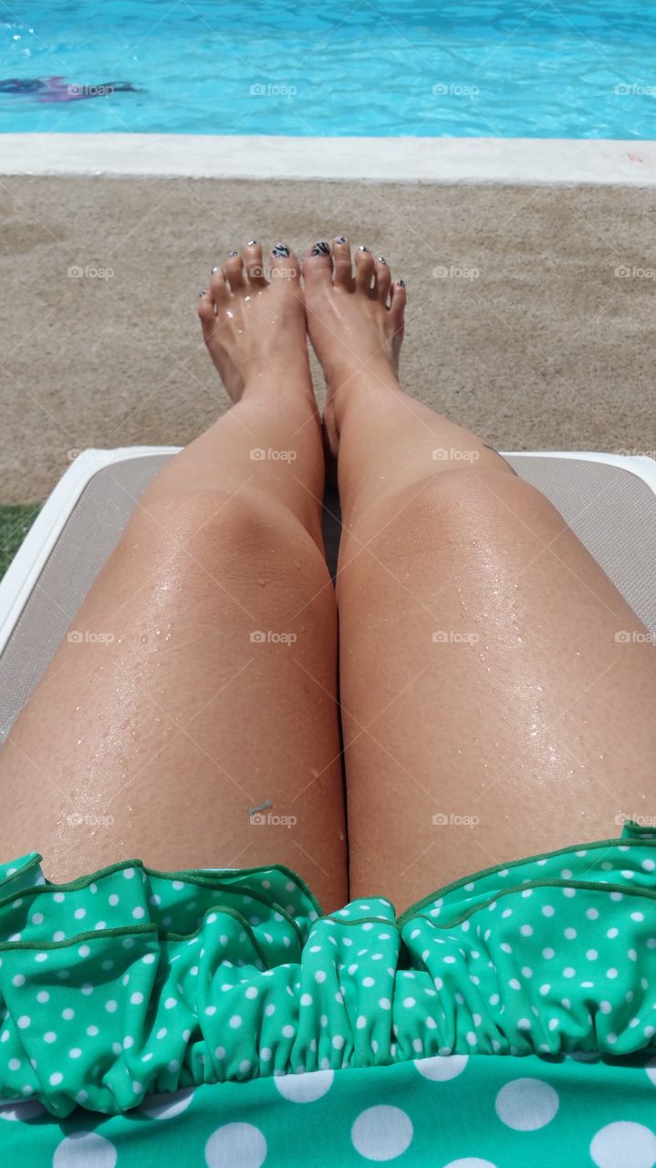 golden wet female  tanned legs