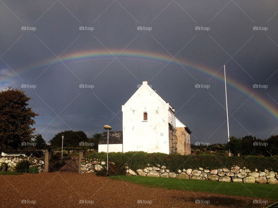 Rainbow over a church 