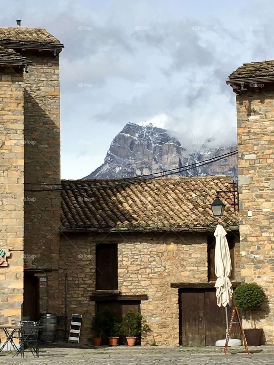 Beautiful scenic shot of the a medieval village nestled in the Pyrenees. 