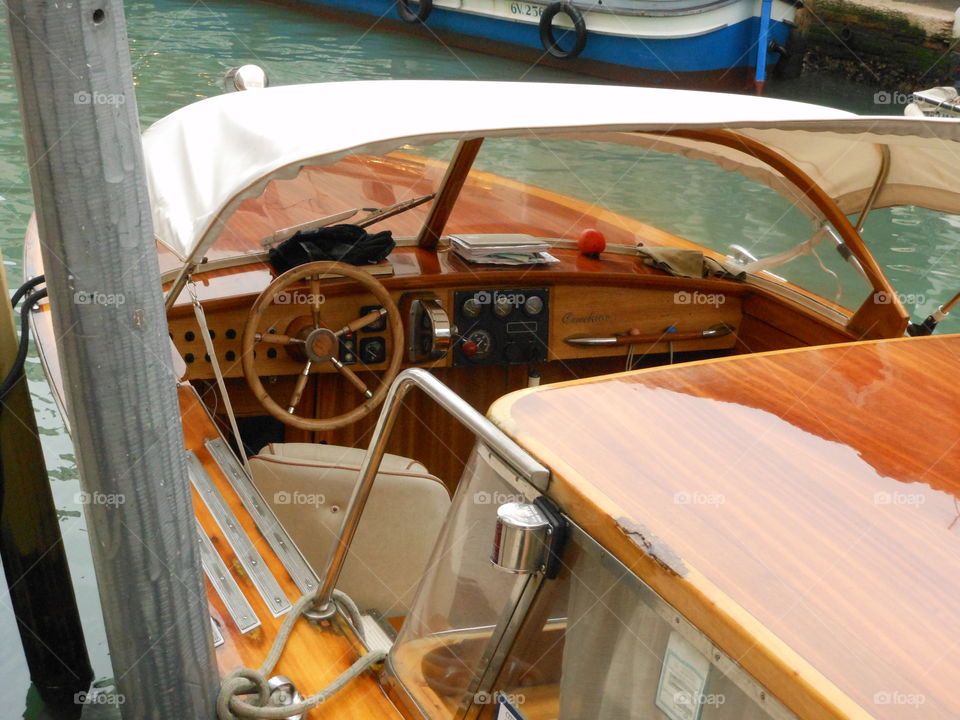 Wood boat in Venice