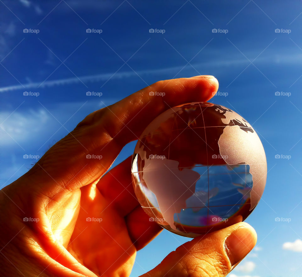 Man holding sphere