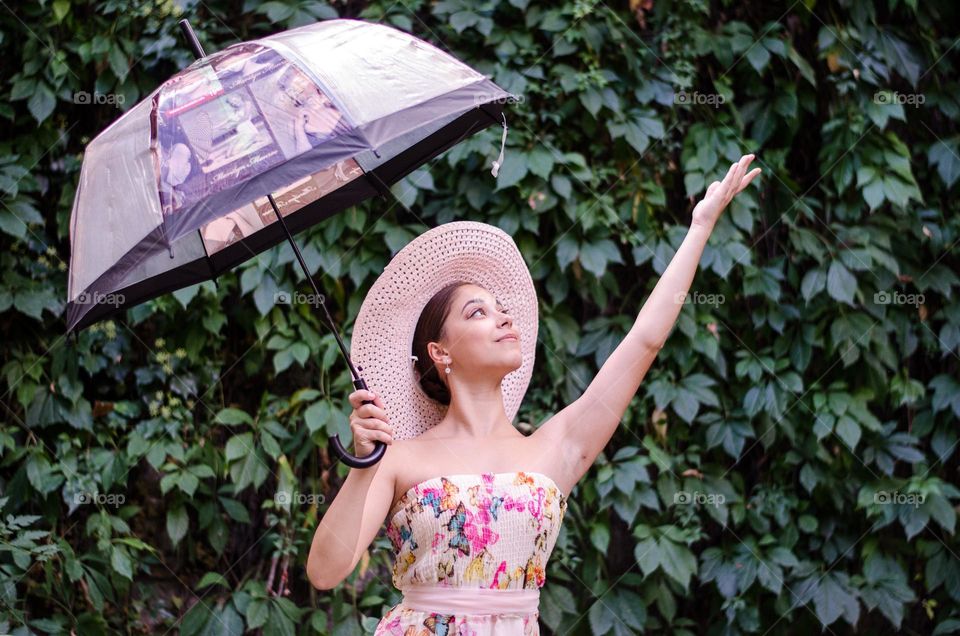 Pretty Young Girl Posing with Umbrella