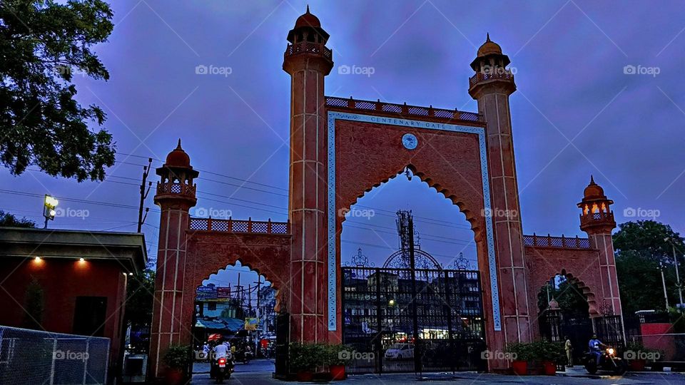 The illuminated archway of the building looks absolutely stunning! π It adds such a magical touch to the surroundings. What a beautiful sight!