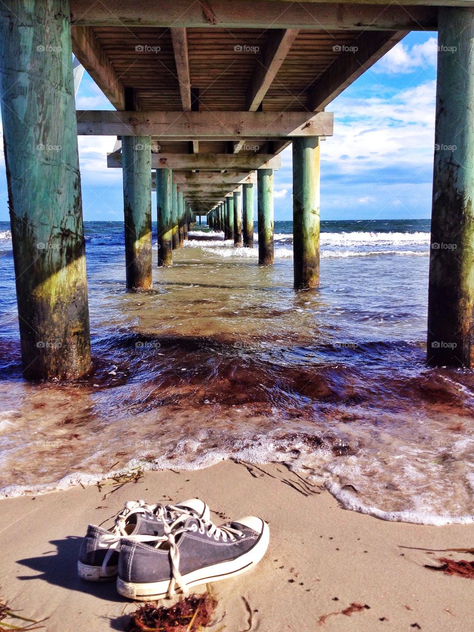 Shoes near surf