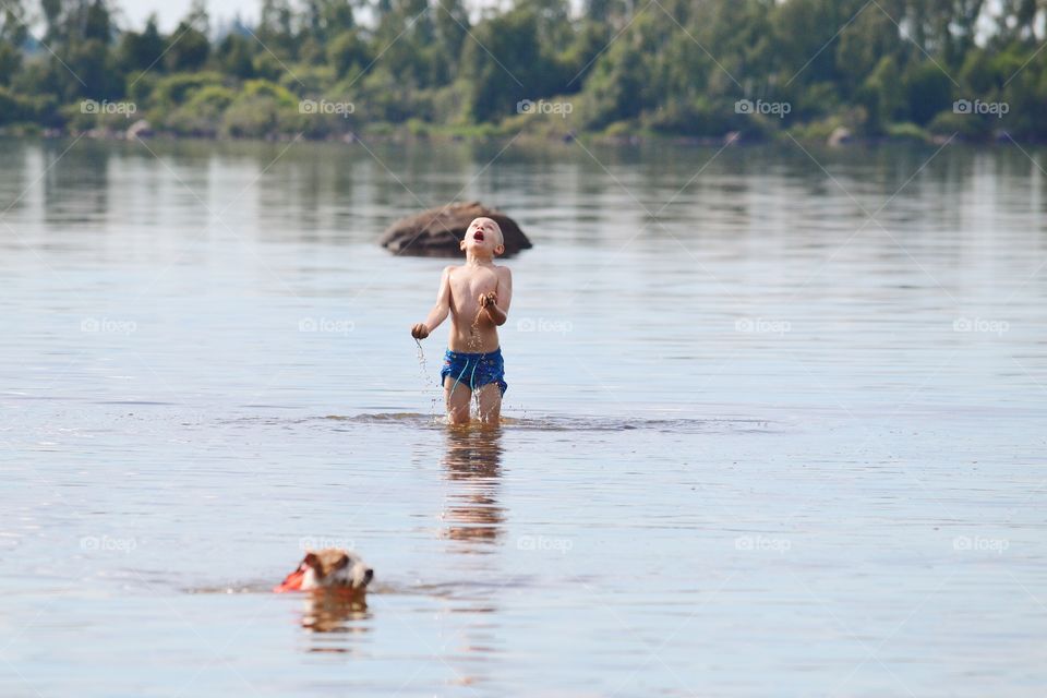 Boy having fun at the lake