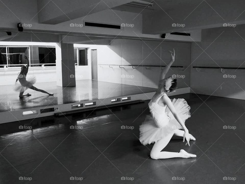 ballerina dance in front of mirrors