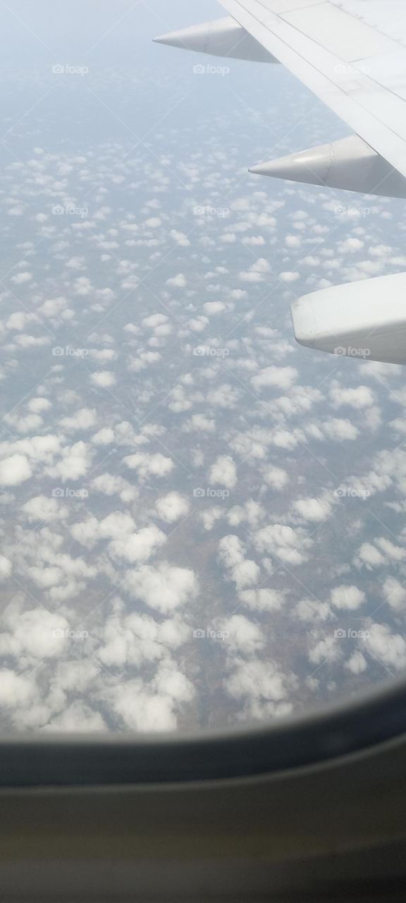 clouds viewed from Airplane window seat