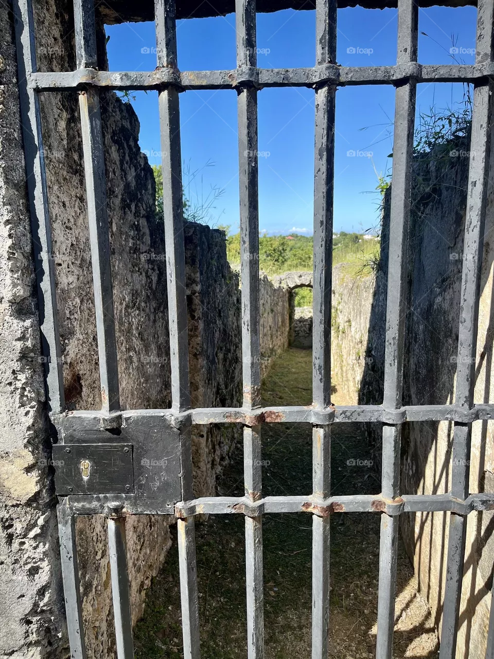 Iron bar door at the entrance of an old fortress