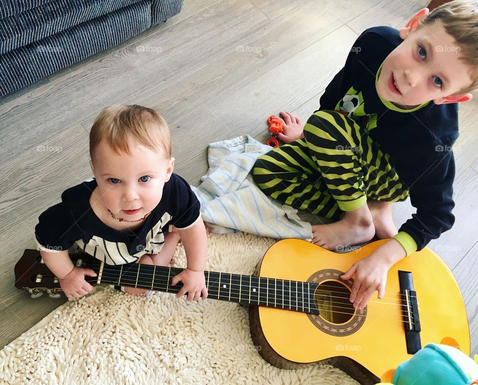 Playing guitar with my brother 