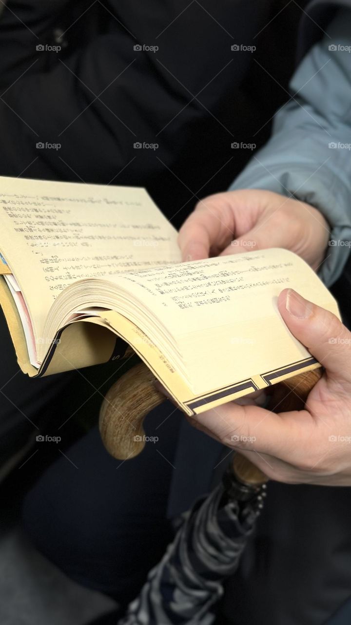 Hand With Japanese Book