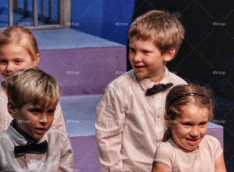 Happy Young Children In Formal Wear