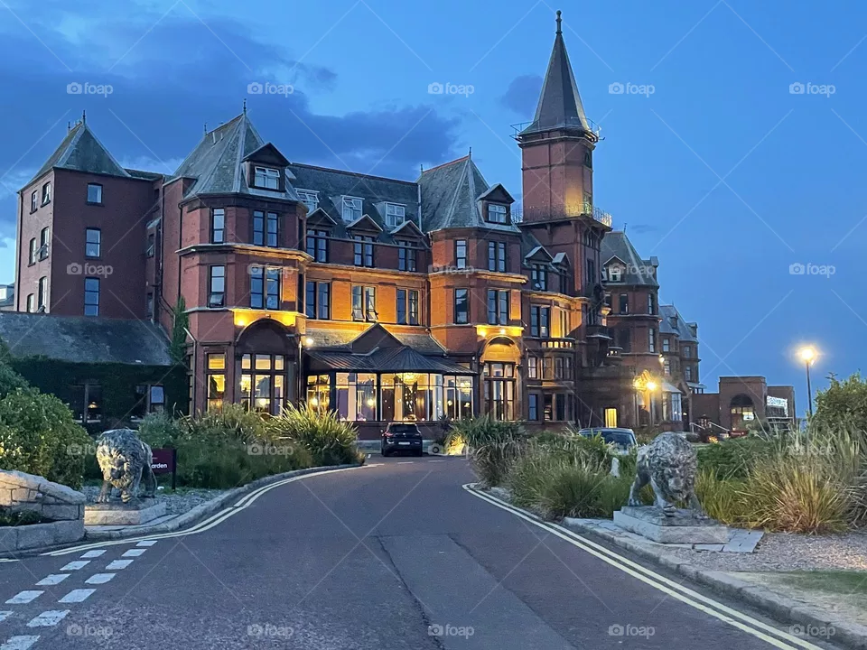 Slieve Donard Hotel lit up on the eve of the Summer Solstice in Newcastle, Northern Ireland.