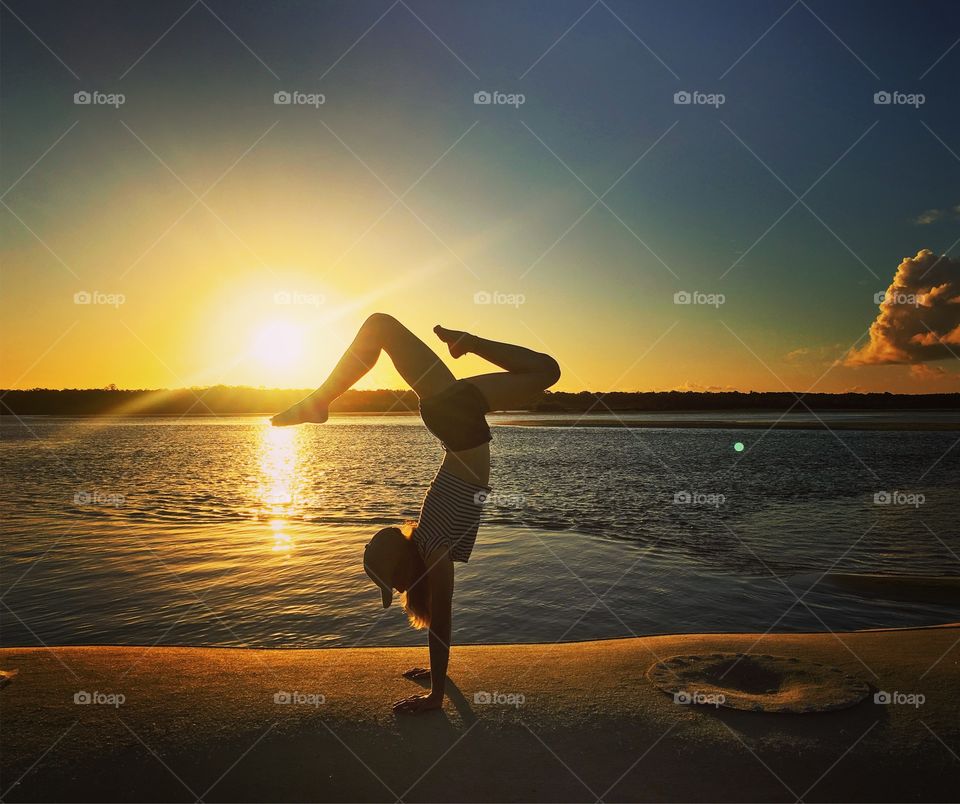 Sunset yoga at the beach 