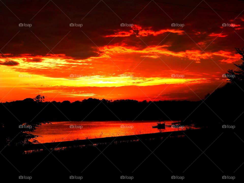 Sunset down on the lake in Indiana with a beautiful sky 