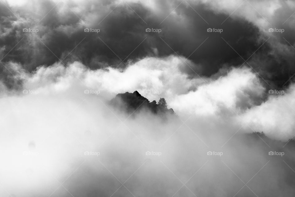 mountain with clouds, black and white