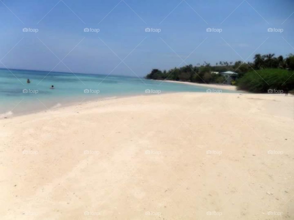 white sand beach of stockli resort, cebu