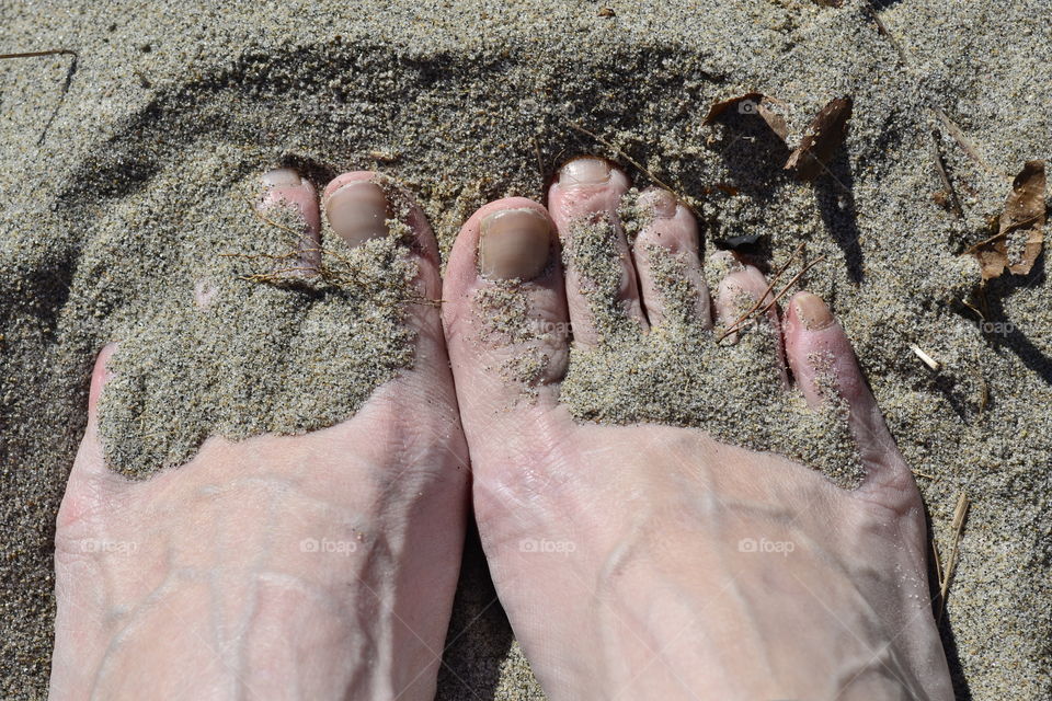 Toes in sand
