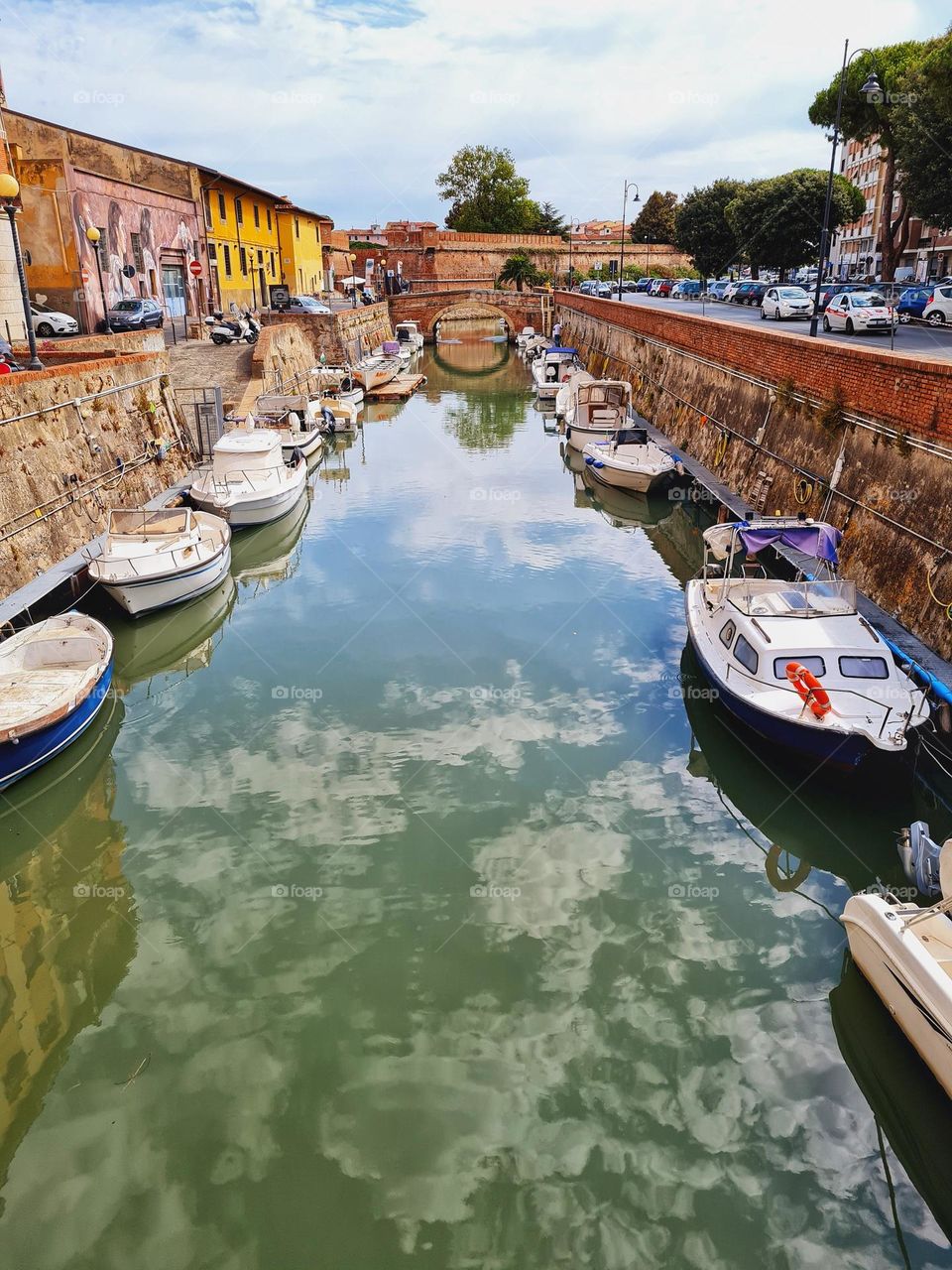 canal with boats in the city of Livorno in Tuscany