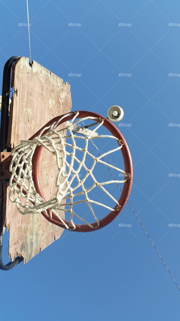 Through the basketball net