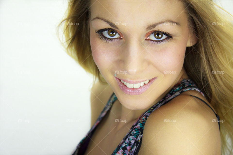 Woman posing in white background