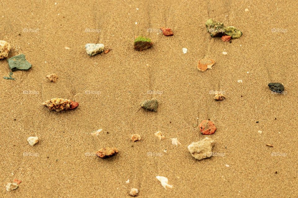 Flat Lay of Beach stones in different colors and sizes