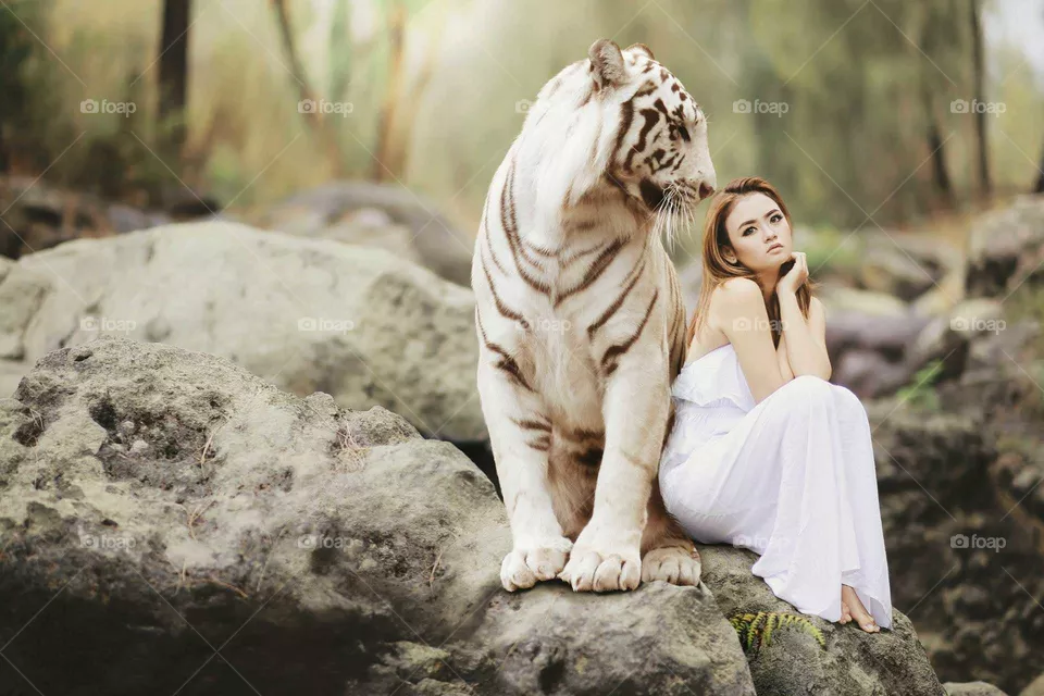 women in white with loin