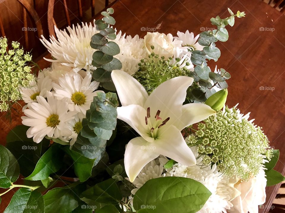 One side of white flowers bouquet.