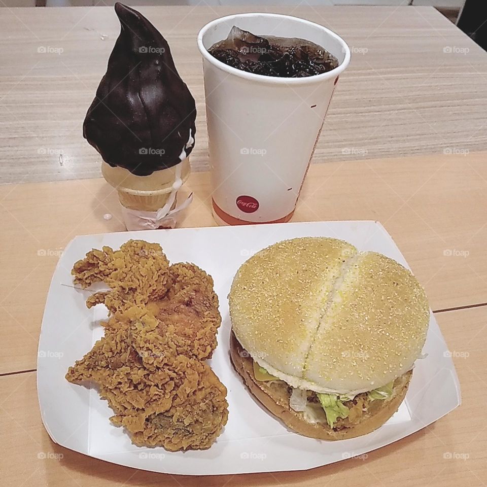 Lunch set with hamburger fried chicken coke ice cream