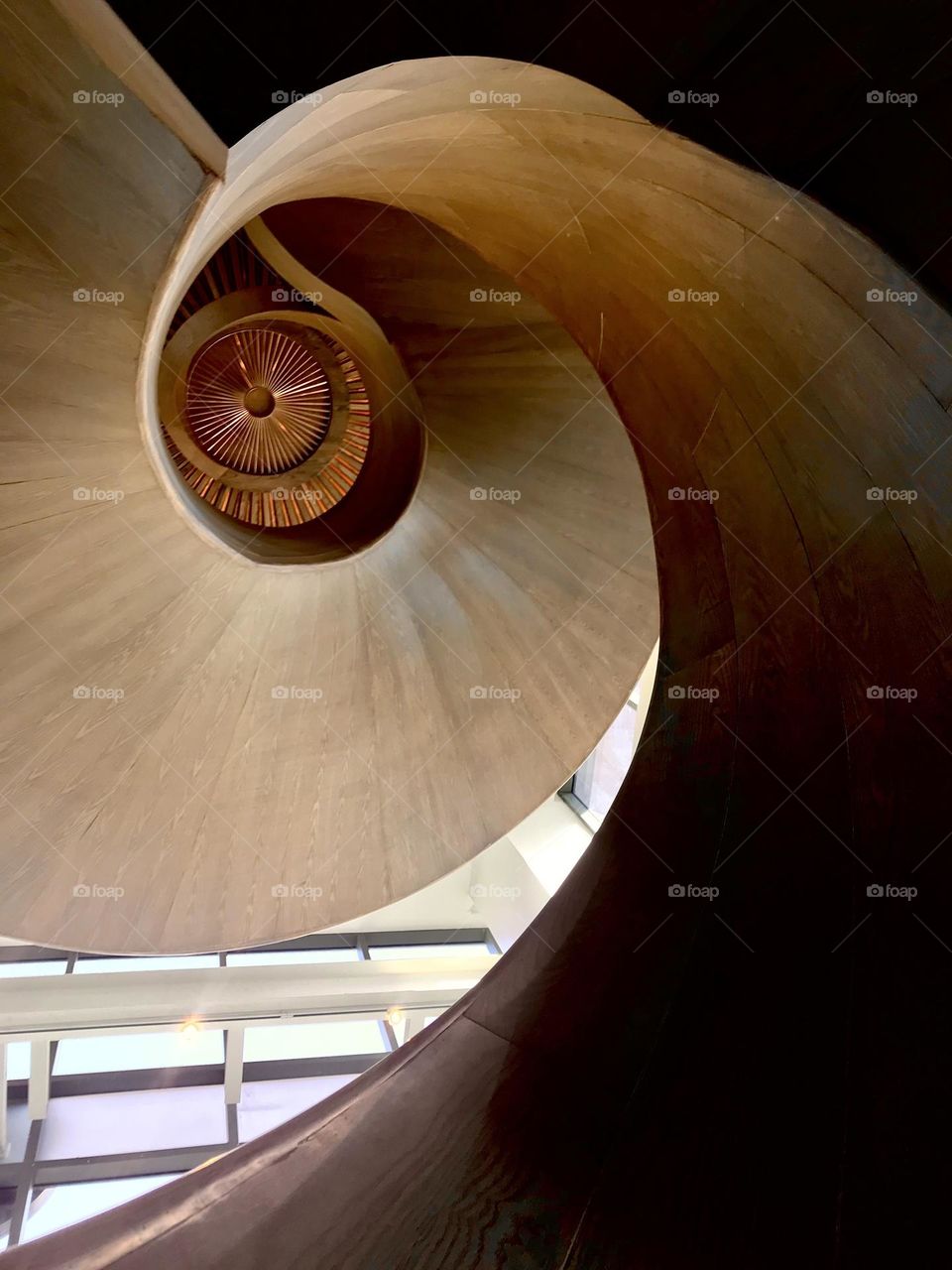 Just like shell eyes view when they are traveling to their house. Under staircase from the ground up to the top of ceiling. Great interior design ever.