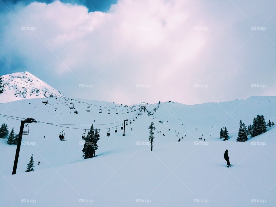 Ski lift over the snowy land