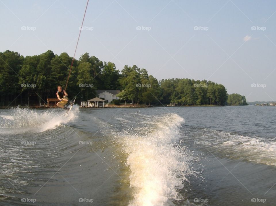 Wakeboarding jump on Lake Gaston, North Carolina. 