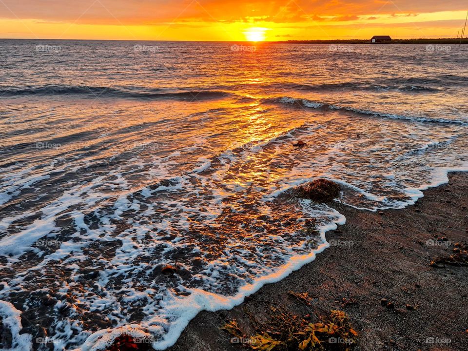 Sunset on the black sand beach