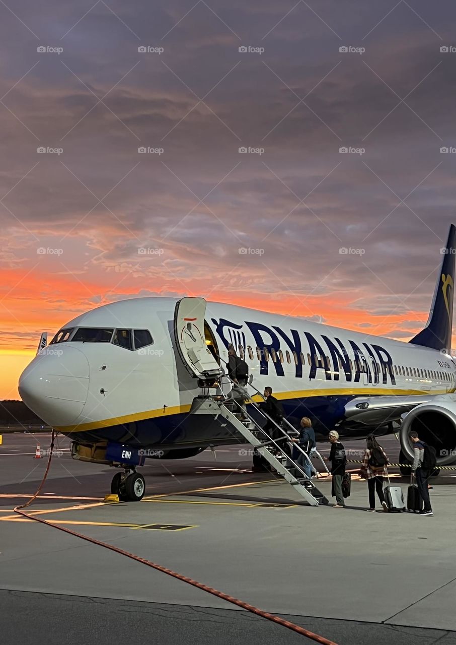 Travel time. Ryanair airplane. Beautiful sunset. Ready for travel.