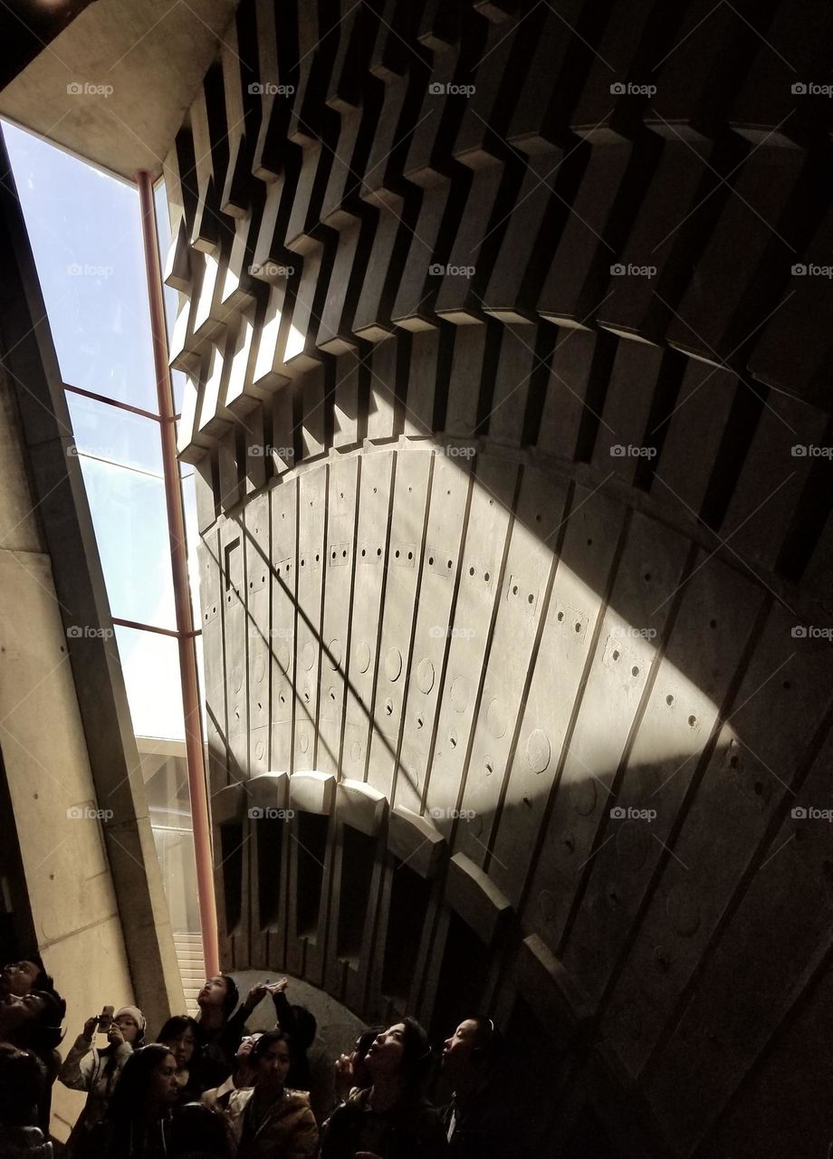 Sydney Opera House acoustic wall with a group of tourists