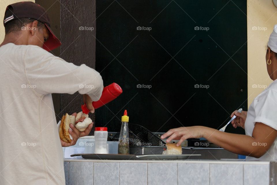 Cuban People.Preparing sandwiches in a cafeteria in Guantanamo