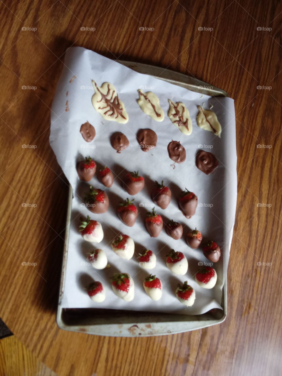 Hand dipped chocolate converted strawberries and chocolate leaves!