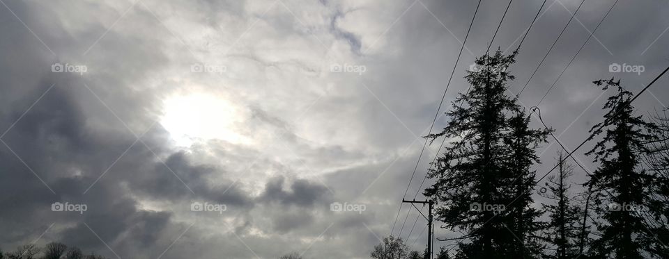 sun breaking through the clouds.