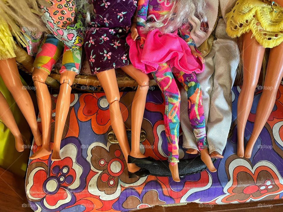 Lot of doll legs on colorful box