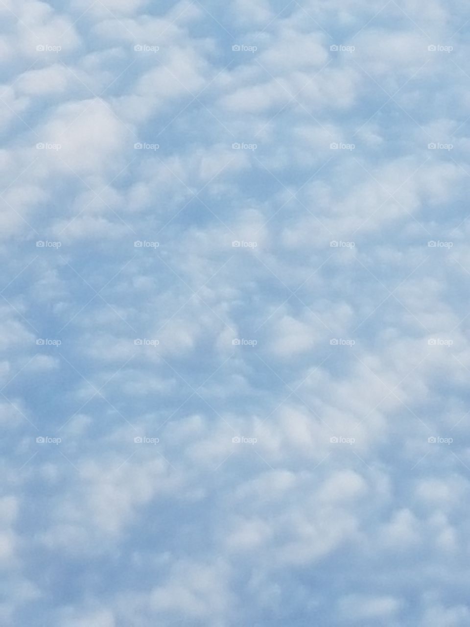 Fluffy cloud formation from the air.