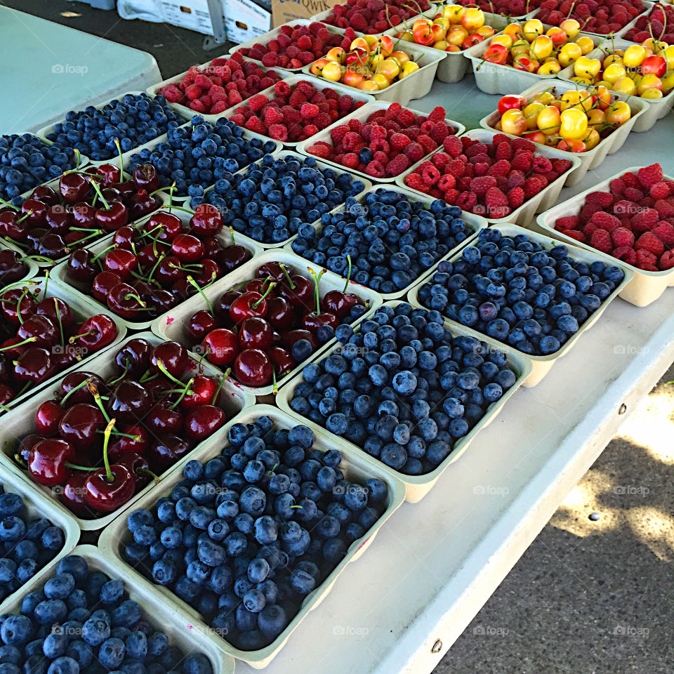 Variety of berries for sale in market