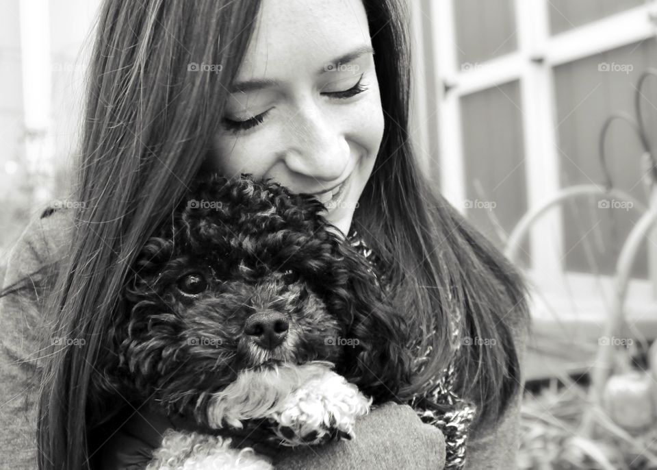 a girl and her puppy